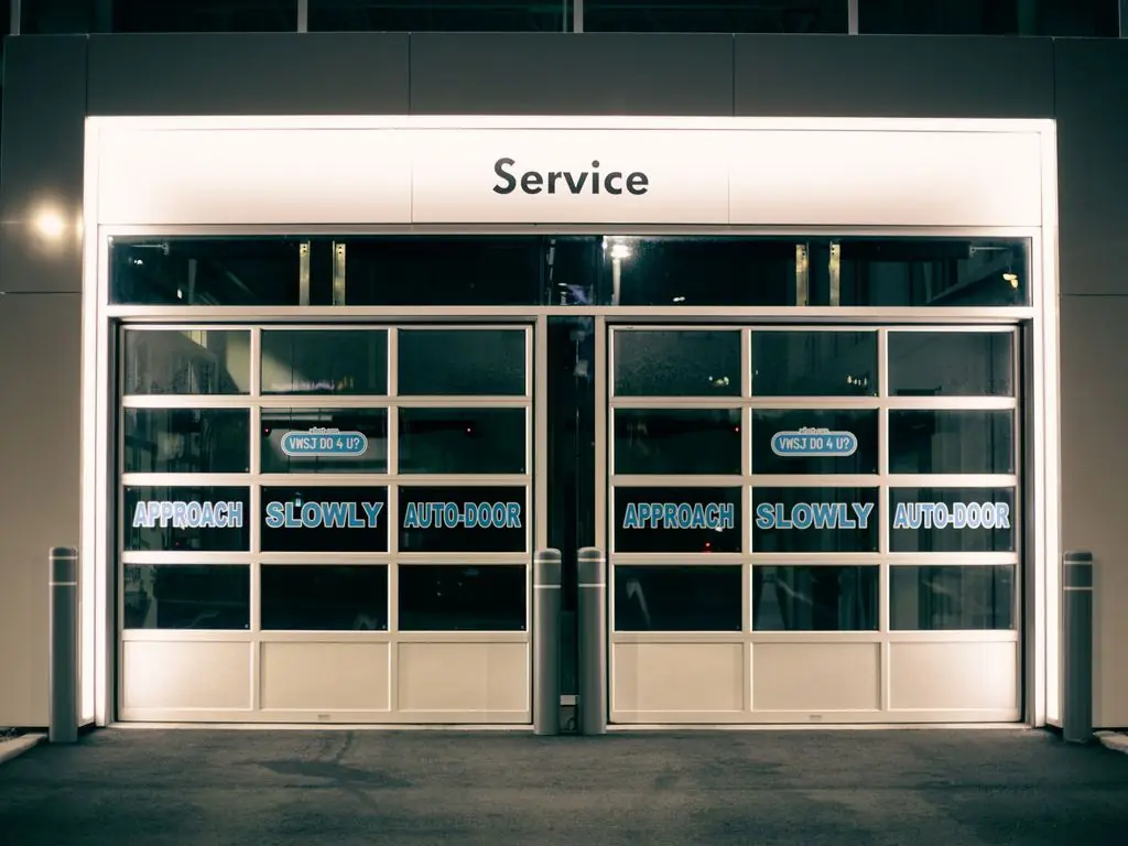 Automatic commercial entrance doors lit at night