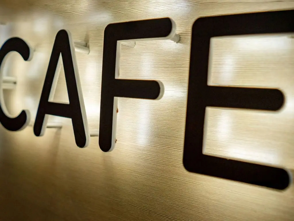 Illuminated dimensional letters mounted on a wall