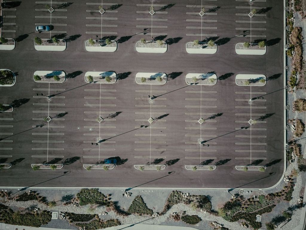 Aerial view of an empty commercial parking lot