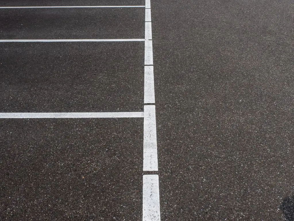 Freshly striped parking lot spaces
