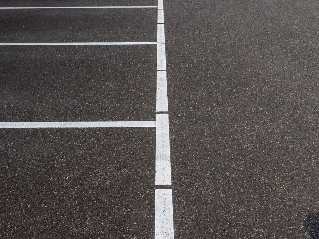 Freshly striped parking lot spaces